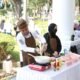 Bupati Luwu Timur Unjuk Kebolehan Membuat Nasi Goreng di HUT Sulsel ke-357